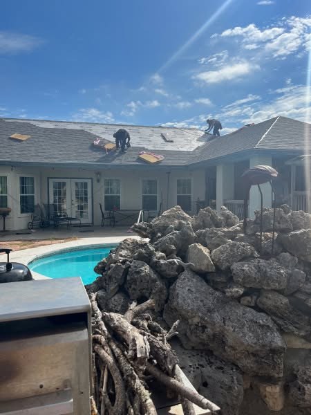 Assessing a roof and surrounding property for storm damage